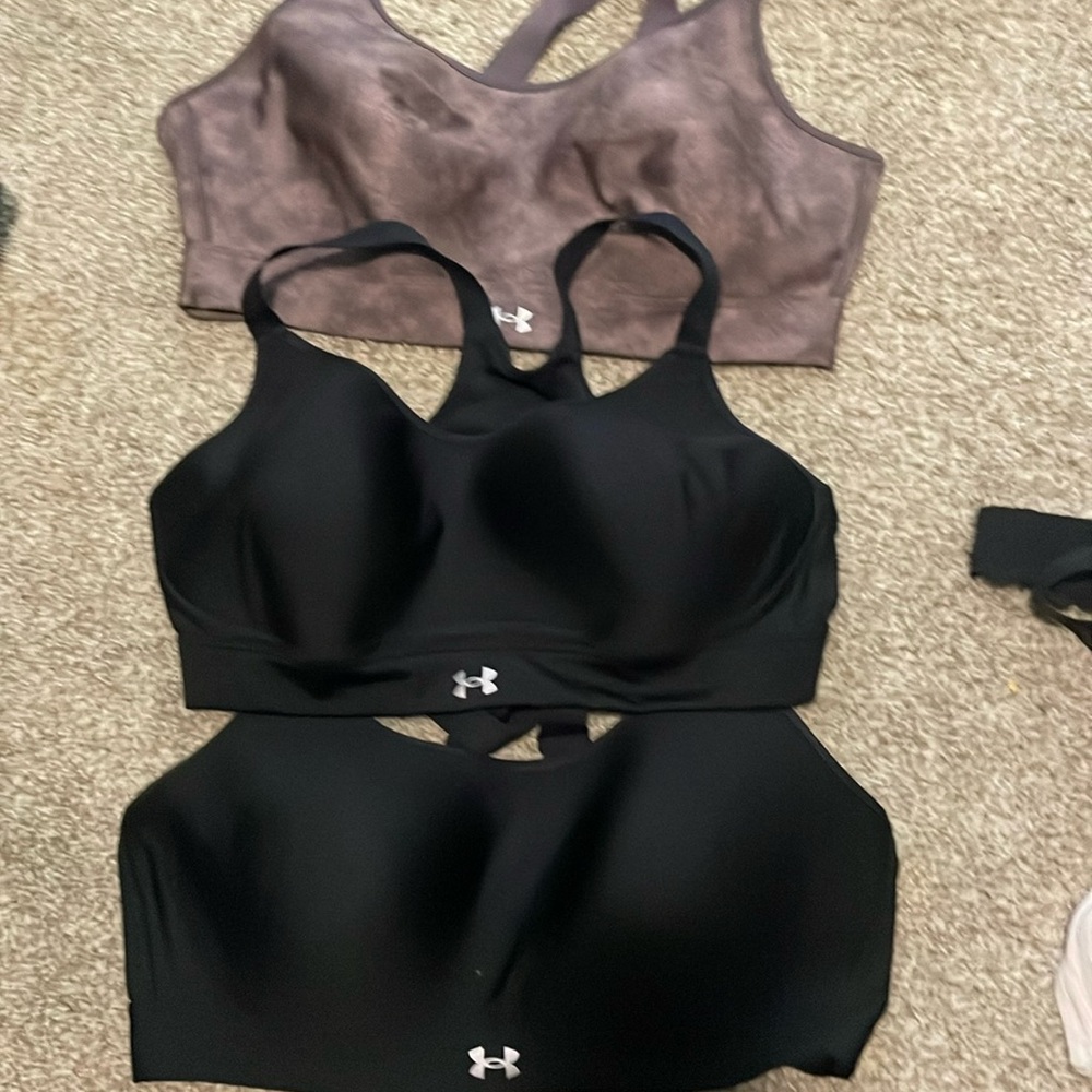 Three Under Armour Sports Bras
